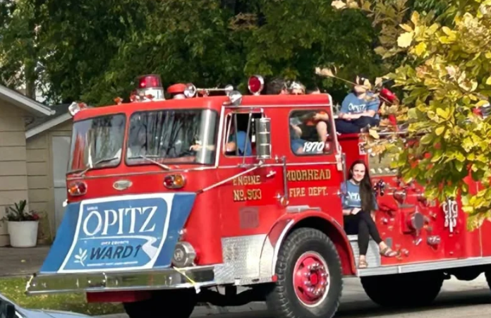 Moorhead City Council candidate Sarah Opitz’s use of fire truck during parade goes to a hearing — Casselton Government news